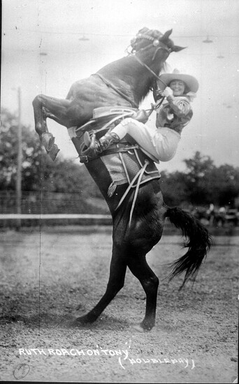 The exhibit includes historic photos such as this one of cowgirl Ruth Roach on her horse, Tony.