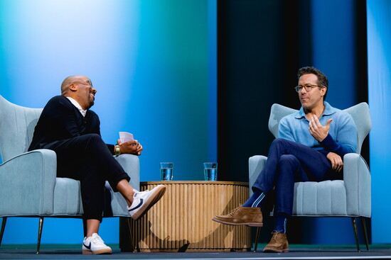 Dr. Marcus Collins in conversation with actor Ryan Reynolds.
