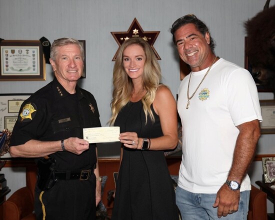 Bret and Allison Laso with Richland County Sheriff Leon Lott