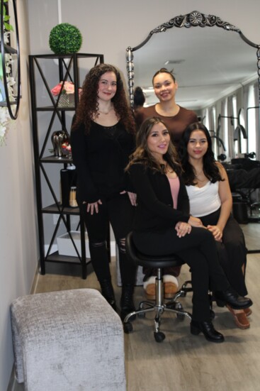 Lash and Glow's staff, clockwise from bottom left, Carla Peralta, Jordan Galvin, Louisette Davila and Yennifer Ibanez .