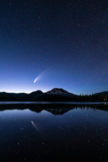 Comet NEOWISE, a once-in 6,800-years visitor, above Oregon's South Sister, casting a rare and mesmerizing glow over the landscape.