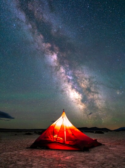 A tent beneath the Milky Way in Oregon's Alvord Desert.