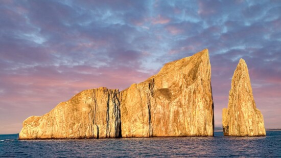 Kicker's Rock (Leon Dormido) is off the coast of San Cristobal and an iconic lava rock formations. The remains of a volcanic cone, eroded by the sea and weather