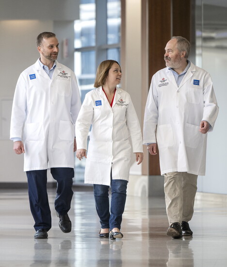 Cancer Center team walking hallways.