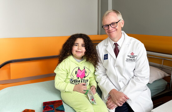 Dr. Parsons with patient Mia.