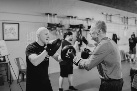 Thomas Stroud, left, with a boxer 