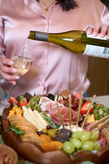 From bold cheeses to fresh fruit and a signature hint of spice, every pour and pairing tells a story.