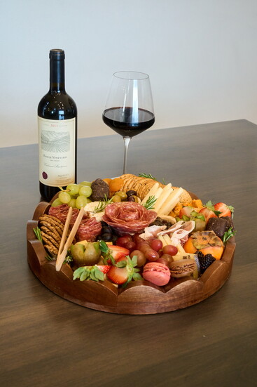 A thoughtfully layered charcuterie board by The Grazing Pear Company, where vibrant flavors, seasonal ingredients, and intentional design come together.