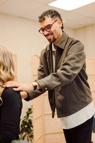 Dr. Trae Masten with a patient.