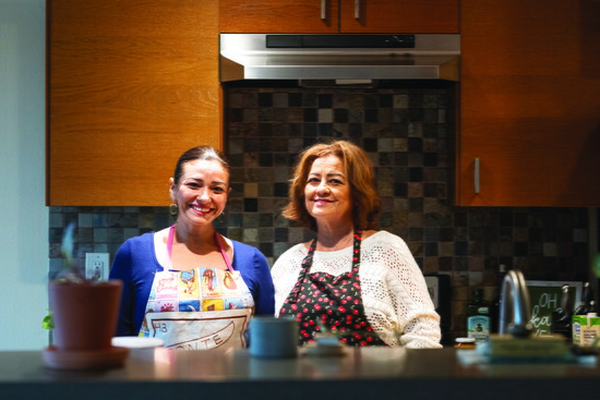 Gia Silva, president of INTI Realty, with her mother.