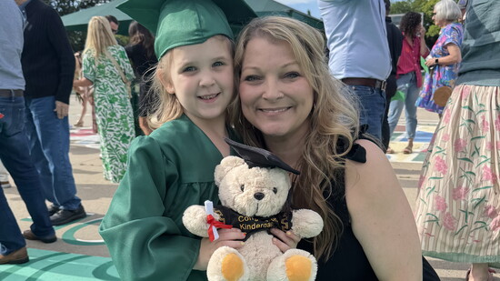Ms. McKinney with little Carroll ISD graduate