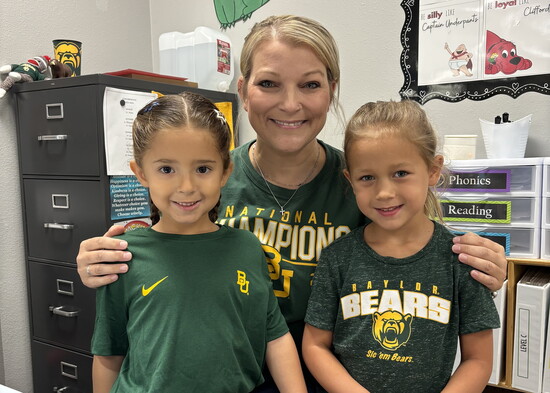 Kindergarten teacher Ms. McKinney with her students