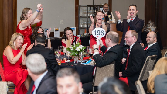 Red Cape Gala fundraiser supporting neuroblastoma research and families navigating pediatric cancer treatment.