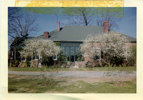 The enclosed porch originally was the entrance.