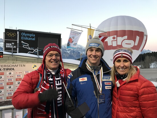 Tucker with his parents, Brett and Pam West