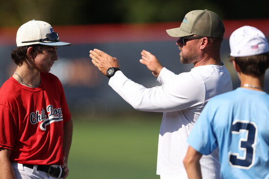 Co-owner, Walker Searcy, coaching one of his players.