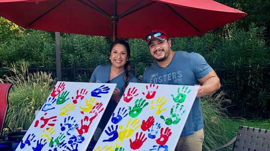 Marcella and her husband, Andrew, volunteering for Love Fosters Hope. 