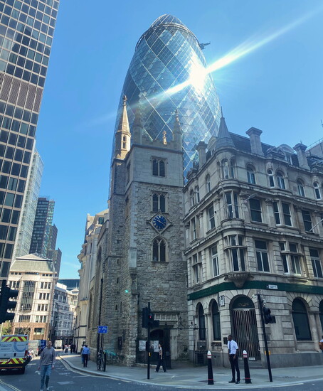 A mix of old & new. St Andrew Undershaft, a parish that dates back to the 15th century stands in front of "The Gherkin."