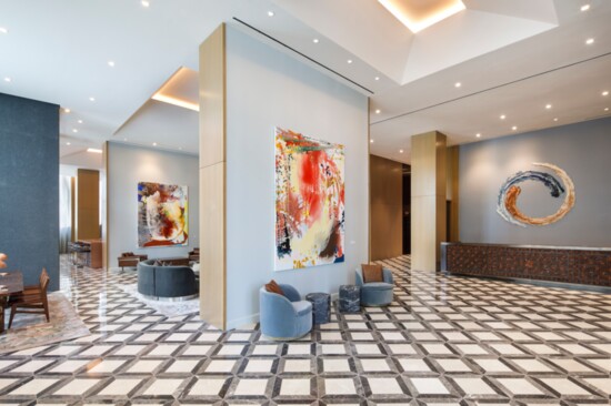 Lobby of The Joseph, a Luxury Collection Hotel, Nashville, featuring paintings by Jackie Saccoccio, ceramic art by Brie Ruais, and a custom designed, hand-toole