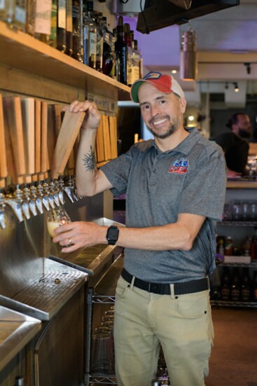 Kraig at the taps at a local Hop City