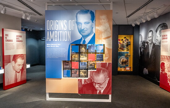 Rotating story blocks trace Lyndon Johnson's early years, highlighting the people, places, and experiences that shaped his worldview and political ambitions.