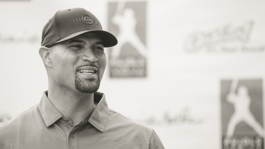 Albert Pujols gives jersey to Nico, a young fan with Down syndrome