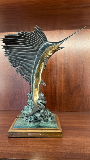 A bronze sailfish in Winston’s office, a nod to the fishing adventures that brought him peace around the world. 