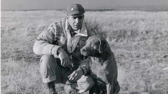 Winston with his Chesapeake Bay retriever, Louis—his loyal companion and a reminder of the outdoors he loves.