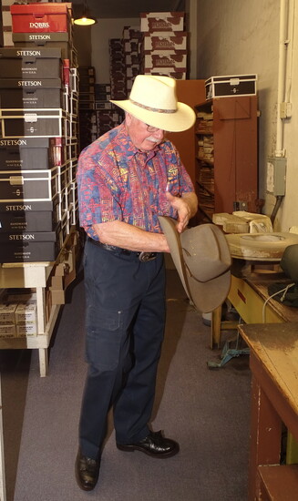 Stuart customizing a hat