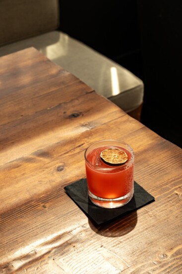 A town favorite - the "Staycation" {Jalapeño Infused Lunazul Tequila, Aperol, Raspberry, Lime, Salt}