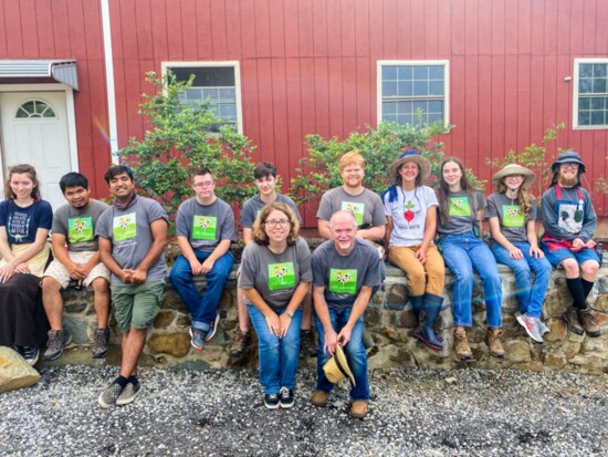 Maya and Greg pose with their Growers at the 2021 ribbon-cutting for the Farm's Lovettsville location