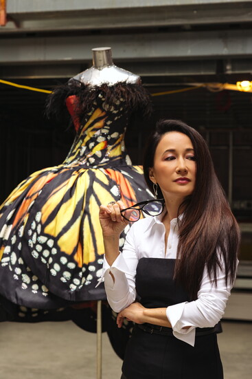 Yang and the Monarch gown in her new experiential showroom