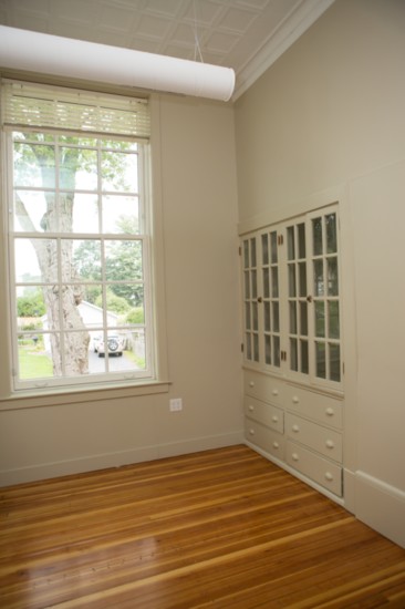 We love the original tin ceilings, hardwood floors and 100-year-old built-ins, once used by the classroom teachers.