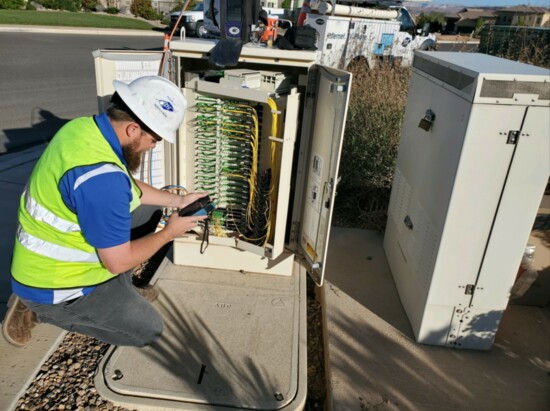 TDS System Technician, Bobby Morrison, checks the fiber light levels at the fiber distribution hub