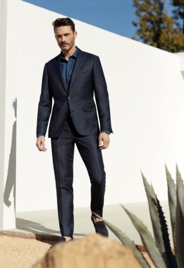 Elevate your style! Navy with light blue gentle plaid suit, blue denim shirt, and navy suede drivers and belt.