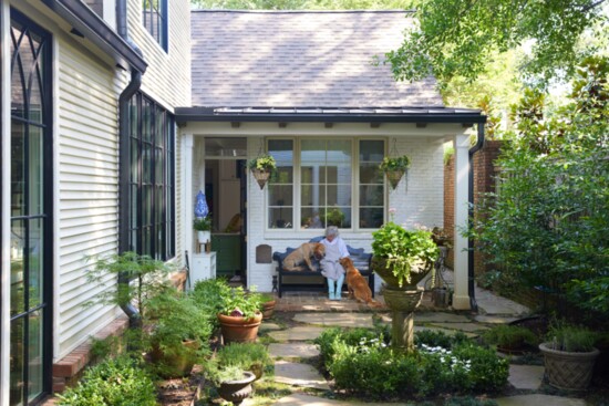 Exquisite gardens provide a colorful setting for this story-filled home.