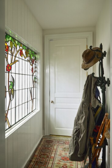 This stained-glass window was gifted to the home’s new owners by Denise Ware and is a charming reminder of lifelong friendship.