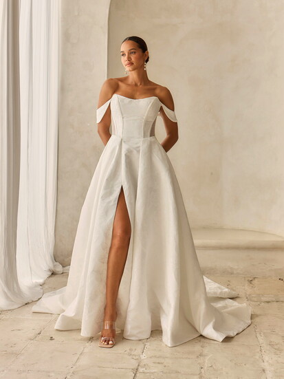 Whether your vibe is sultry glam, clean contemporary, or full-on princess energy, these show-stopping gowns were made to leave a lasting impression.
