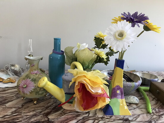 This well-loved entryway credenza holds the beautiful, chaotic parts of Suzanne's life, from sunglasses to the kids' artwork.