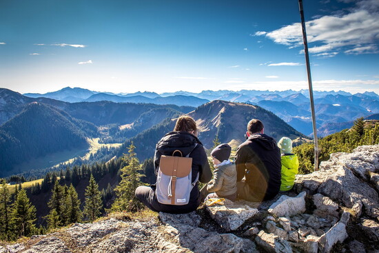 A couple looks over the mountains of 