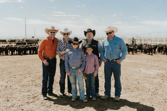 Trent Johnson with members of the Larson Family Larson Family [Photo Credit: Taryn Ashlee Photography]