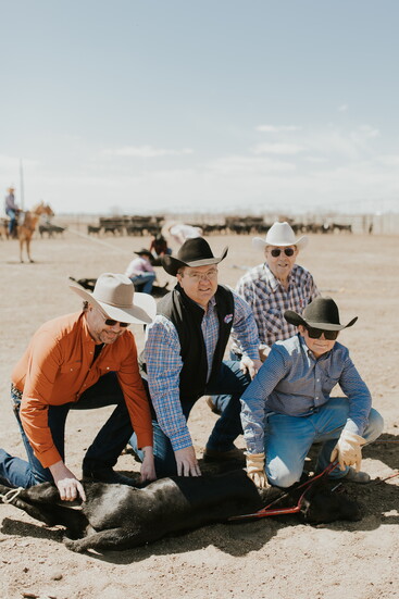 Trent Johnson with members of the Larson Family [Photo Credit: Taryn Ashlee Photography]