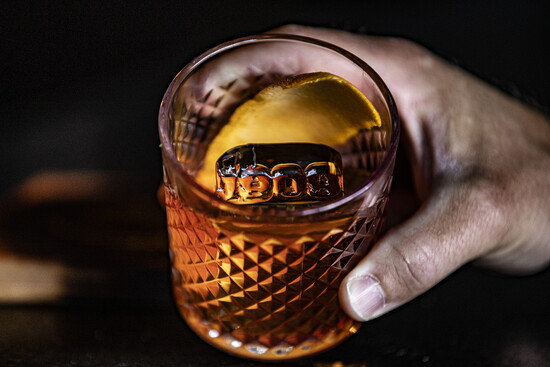 The Smoked Old Fashioned and Bison Burger: the mayor-approved combo at 1909.