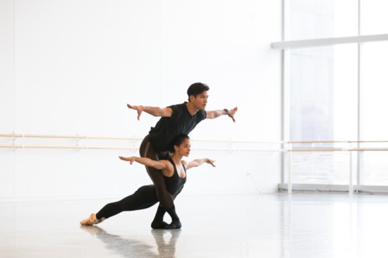 Houston Ballet Principals Karina González and Chun Wai Chan rehearsing Jerome Robbins’ The Cage