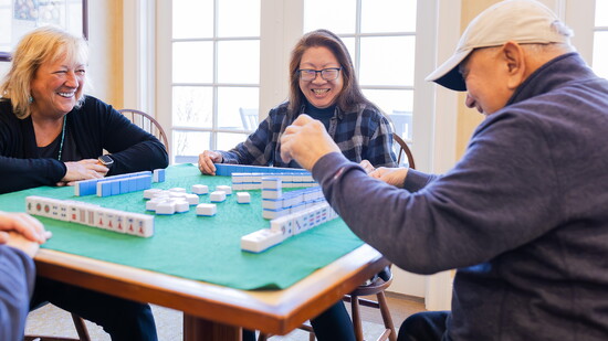 Lorilee Palazzo, Nancy Brandon, Antonio Villanueva enjoy a game of Mahjong 