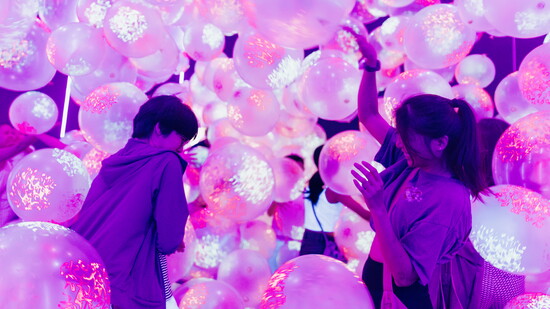 Visitors explore giant inflatable installations at Houston’s new Balloon Museum exhibition, Pop Air.