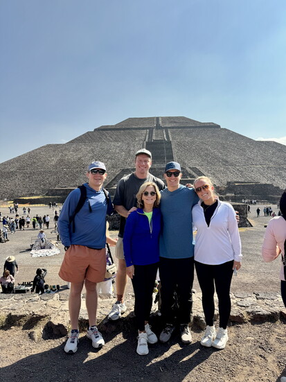 Marianne with four of her five children during a memorable visit to Chichen Itza.