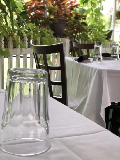 The patio at Red Fox Restaurant is an intimate outdoor dining space.