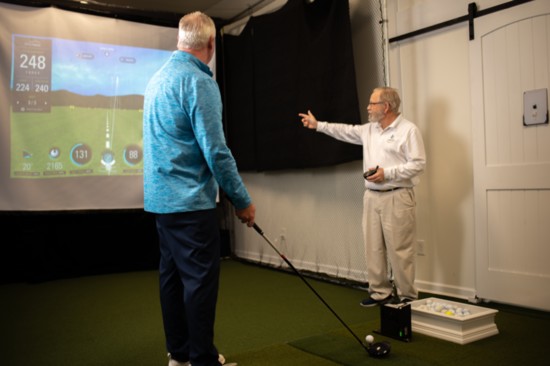 Golf simulation technology measures swing distance and carry