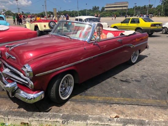Peggy Parolin takes a turn behind the wheel in Cuba. 